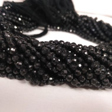 black spinel round faceted